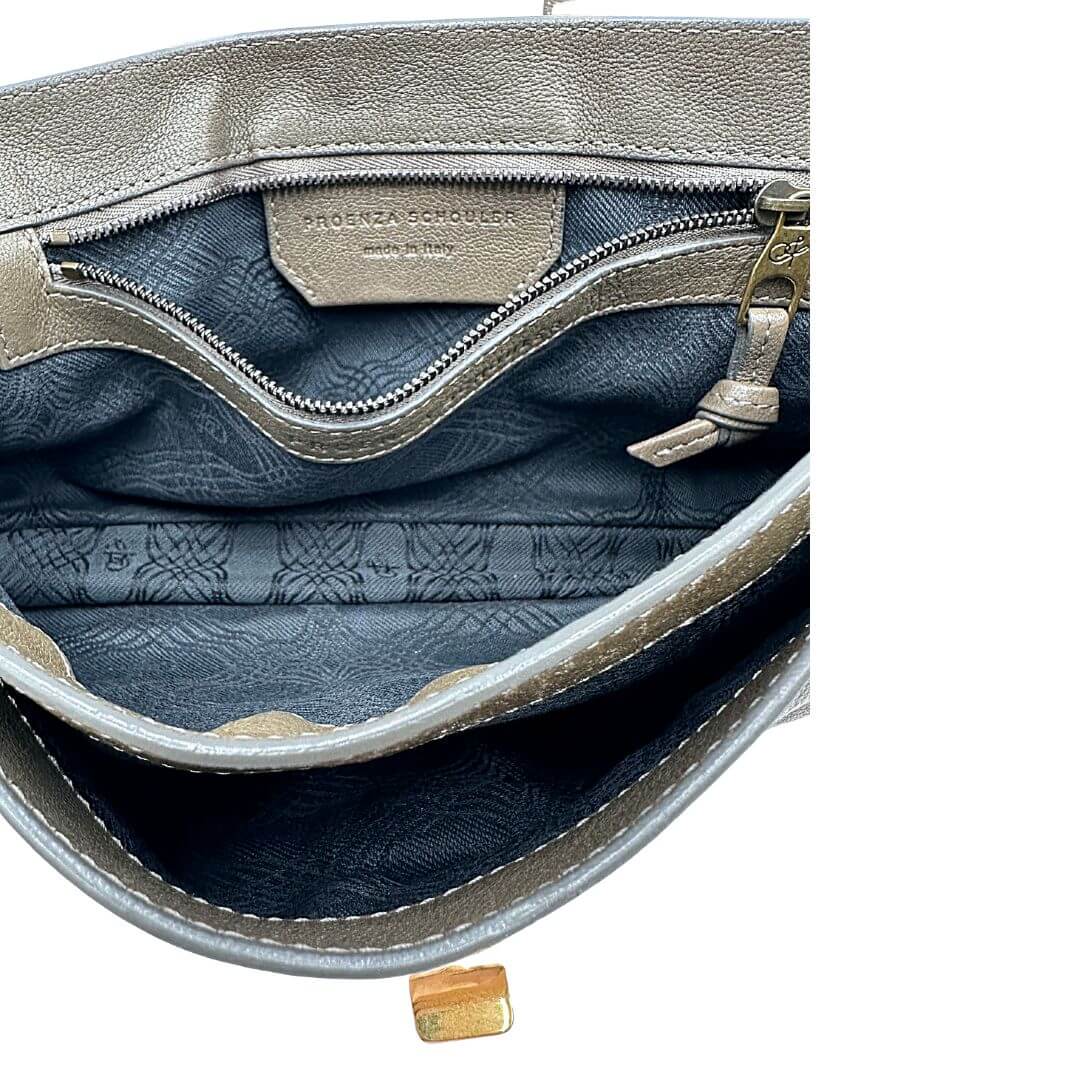 Pochette Proenza Schouler in pelle marone fango con parti metalliche dorate. Originale, usato, in condizioni ottime.