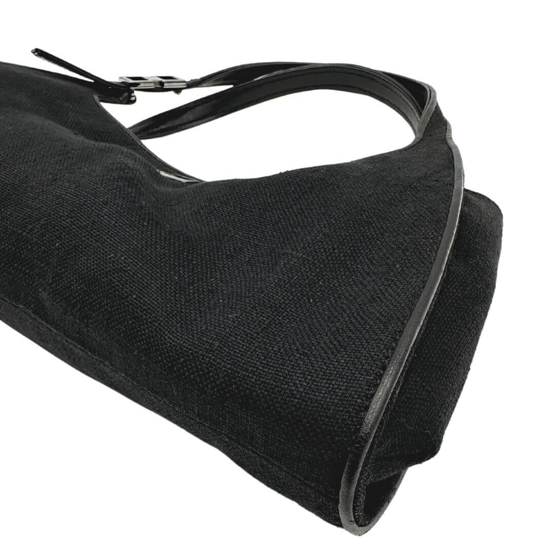 Borsa Gucci in tessuto nero con finiture in pelle tono su tono e parti metalliche argentate. Munita di doppi manici, da indossare a spalla. Originale, usato, in condizioni ottime.