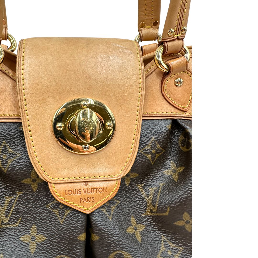 Chiusura, Borsa LV Trouville in tela monogram e vacchetta naturale. Originale, usata, di lusso, in ottime condizioni.