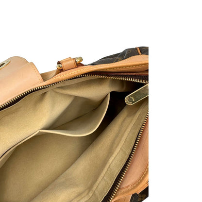 Interno, Borsa LV Trouville in tela monogram e vacchetta naturale. Originale, usata, di lusso, in ottime condizioni.