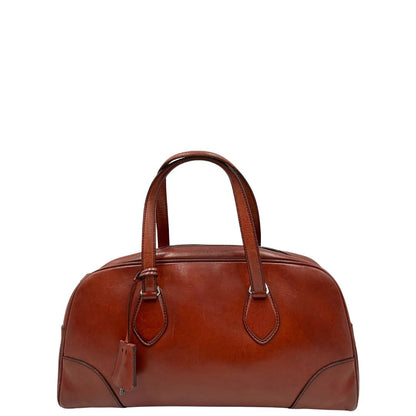 front Borsa Prada in pelle color terracotta con parti metalliche argentate; munita di doppi manici. Completa di dustbag, lucchetto e chiavi, di lusso, originale, ottime condizioni. 