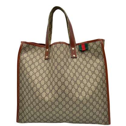 front Tote Gucci in canvas GG beige con profili in pelle marrone e dettaglio Web verde e rosso, munita di doppi manici, indossabile a spalla, di lusso, originale, ottime condizioni. 