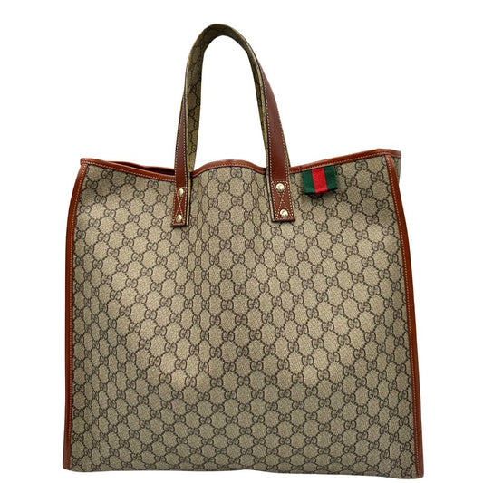 front Tote Gucci in canvas GG beige con profili in pelle marrone e dettaglio Web verde e rosso, munita di doppi manici, indossabile a spalla, di lusso, originale, ottime condizioni. 