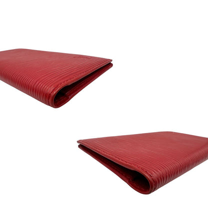 Angoli Portacarte Louis Vuitton in pelle Epi rossa; completo di dustbag, di lusso, originale, usato.