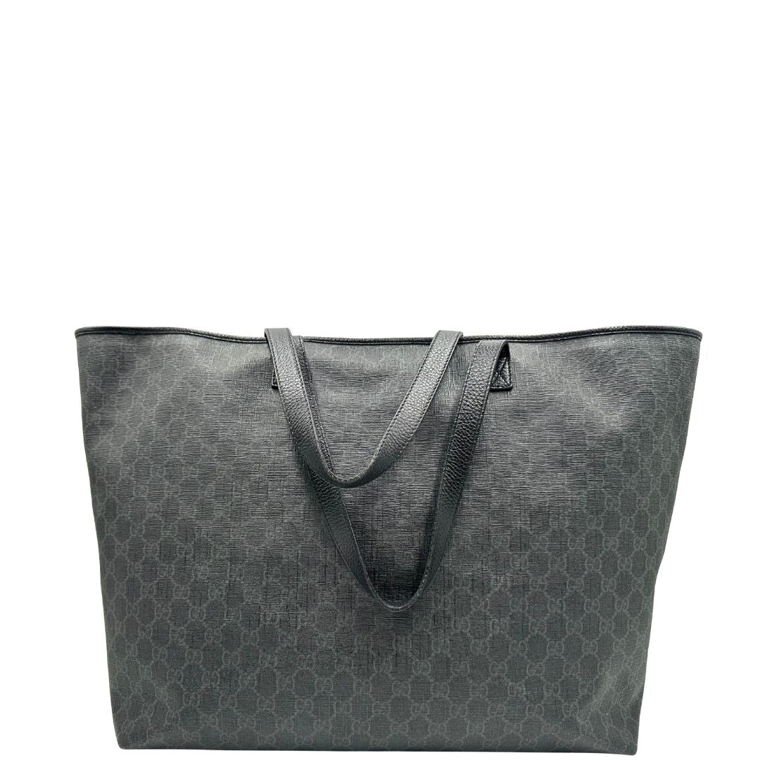 retro Borsa Gucci in canvas GG antracite con finiture in pelle martellata; munita di doppi manici, indossabile a spalla. Completa di dustbag, di lusso, originale, ottime condizioni. 