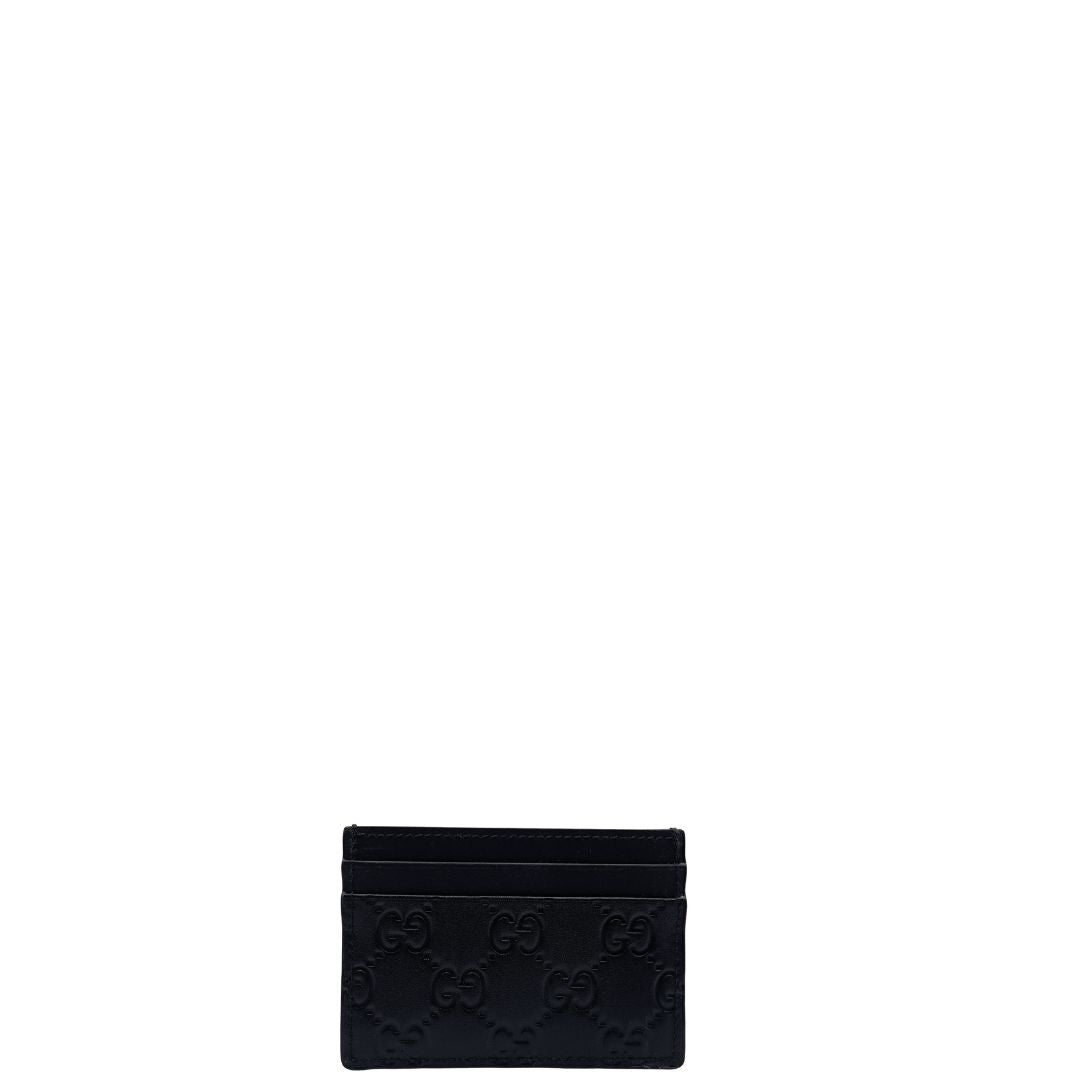 Portacarte Gucci GG in pelle nera trama Guccissima. 