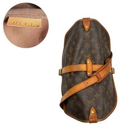 Borsa Saumur 35 Louis Vuitton in canvas marrone monogram con finiture in vacchetta naturale e parti metalliche dorate; da indossare a tracolla, di lusso, originale, ottime condizioni. 
