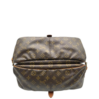 base Borsa Saumur 35 Louis Vuitton in canvas marrone monogram con finiture in vacchetta naturale e parti metalliche dorate; da indossare a tracolla, di lusso, originale, ottime condizioni. 