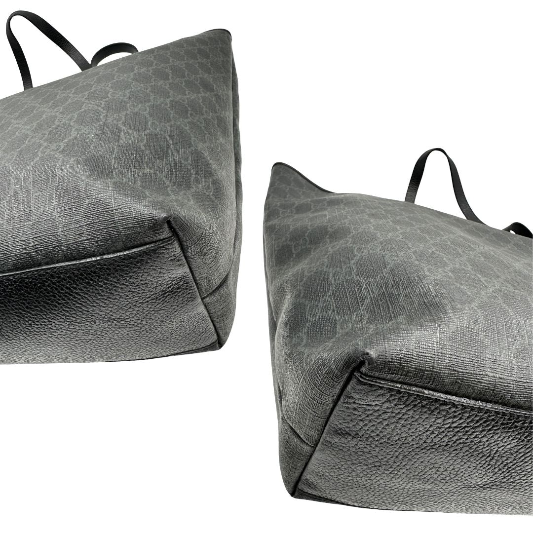 angoli Borsa Gucci in canvas GG antracite con finiture in pelle martellata; munita di doppi manici, indossabile a spalla. Completa di dustbag, di lusso, originale, ottime condizioni.