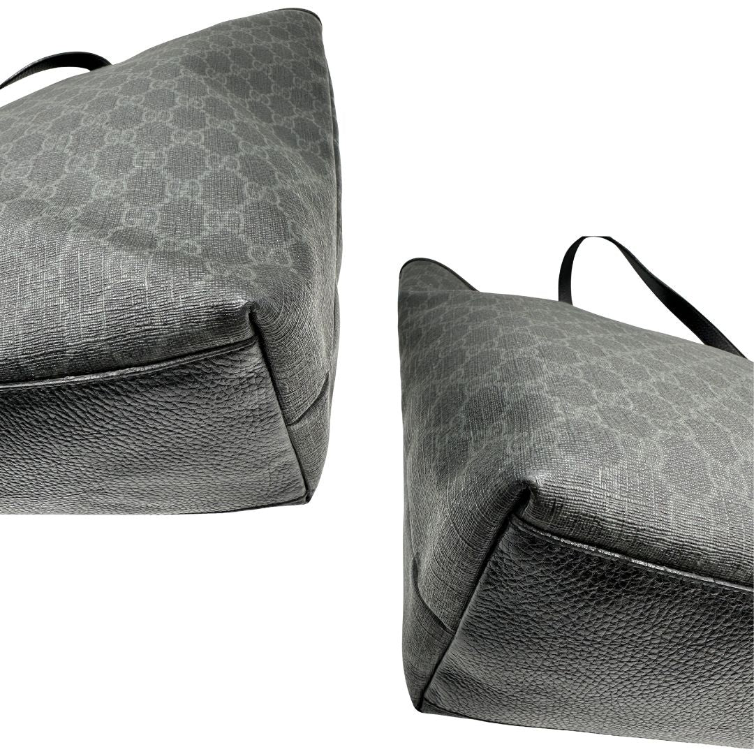 angoli Borsa Gucci in canvas GG antracite con finiture in pelle martellata; munita di doppi manici, indossabile a spalla. Completa di dustbag, di lusso, originale, ottime condizioni. 