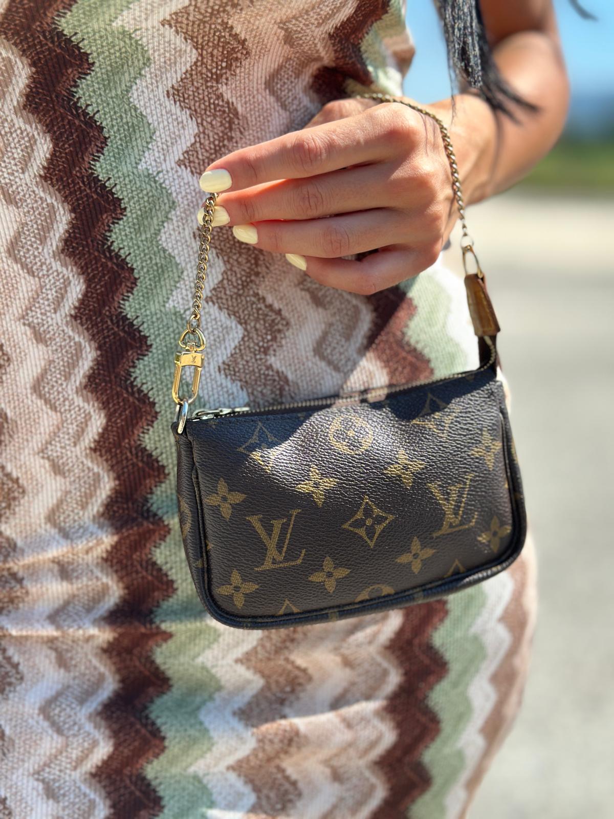 Pochette Accessoies mini Louis Vuitton