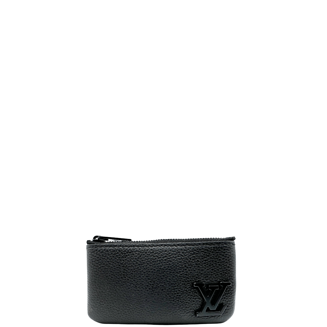 Pochette Clé Louis Vuitton in pelle nera aerogram. Accessori di lusso usati ed originali