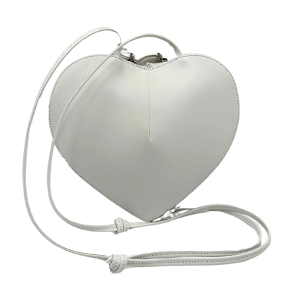 Alaïa Le Coeur: borsa iconica a forma di cuore in pelle bianca, raffinata e unica nel suo design romantico, perfetta per un look elegante e moderno.