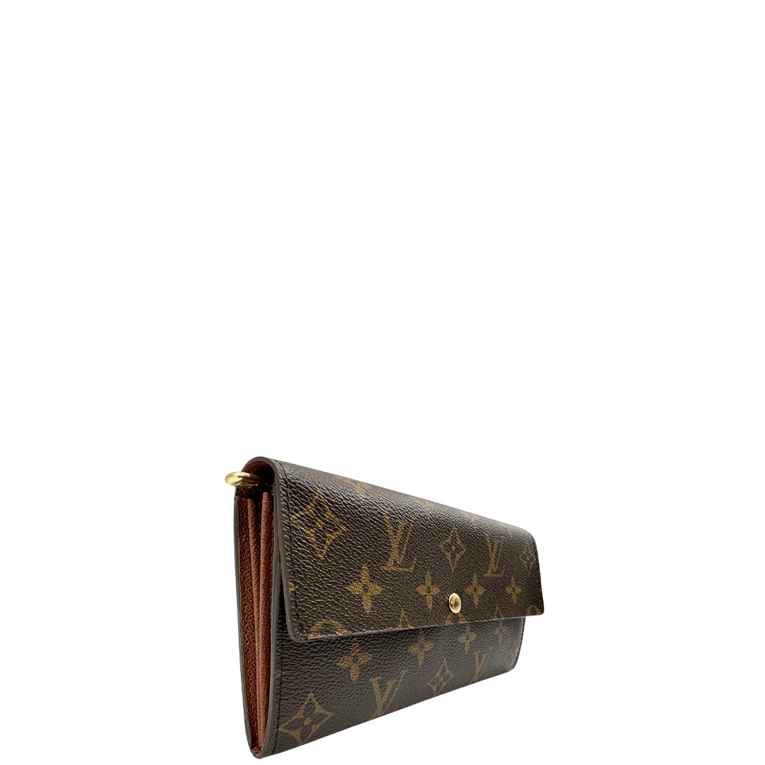 Portafoglio Louis Vuitton monogram corredato. 