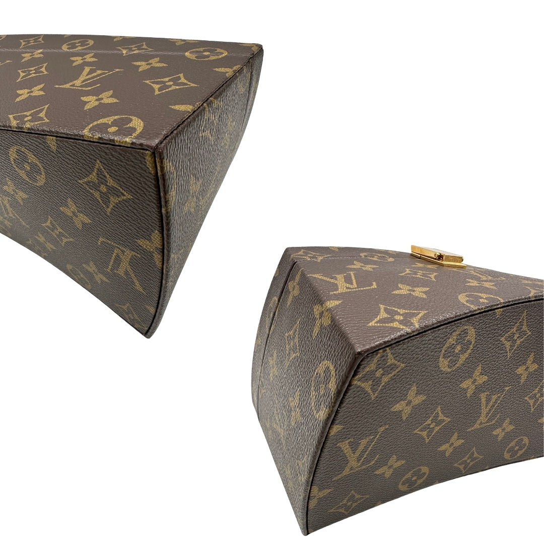 Tote Twisted Box Louis Vuitton x Frank Gehry in canvas marrone monogram con finiture in vacchetta naturale e parti metalliche dorate. Completo di corredo. Originale, usato, in condizioni ottime. 