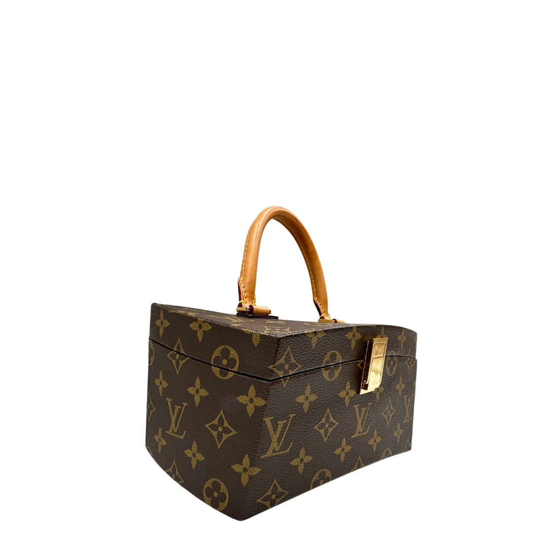 Tote Twisted Box Louis Vuitton x Frank Gehry in canvas marrone monogram con finiture in vacchetta naturale e parti metalliche dorate. Completo di corredo. Originale, usato, in condizioni ottime. 