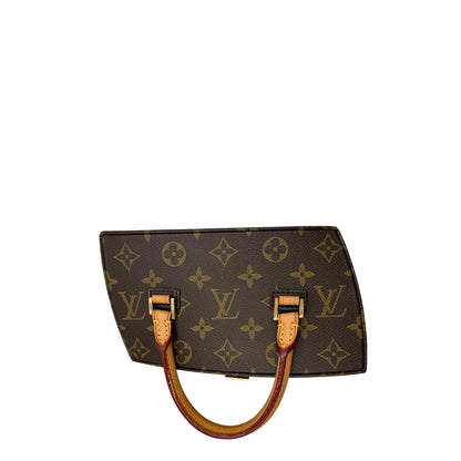 Tote Twisted Box Louis Vuitton x Frank Gehry in canvas marrone monogram con finiture in vacchetta naturale e parti metalliche dorate. Completo di corredo. Originale, usato, in condizioni ottime. 