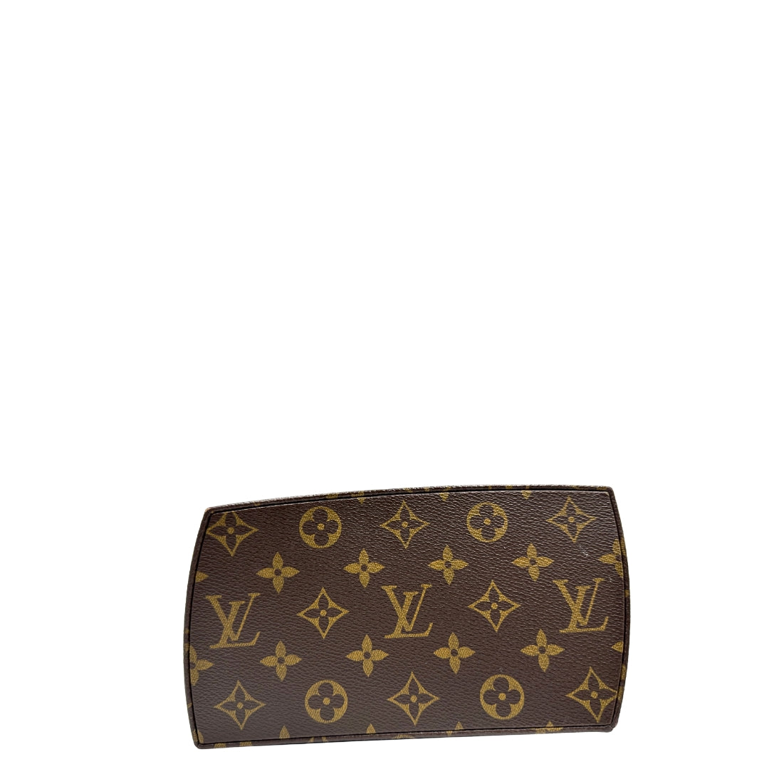 Tote Twisted Box Louis Vuitton x Frank Gehry in canvas marrone monogram con finiture in vacchetta naturale e parti metalliche dorate. Completo di corredo. Originale, usato, in condizioni ottime. 