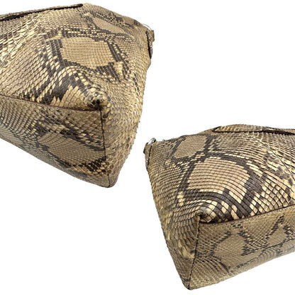 angoli Borsa Prada in pelle con trama animalier rifinita con inserti metallici argentati e ricami marroni; munita di un manico singolo, da portare a spalla