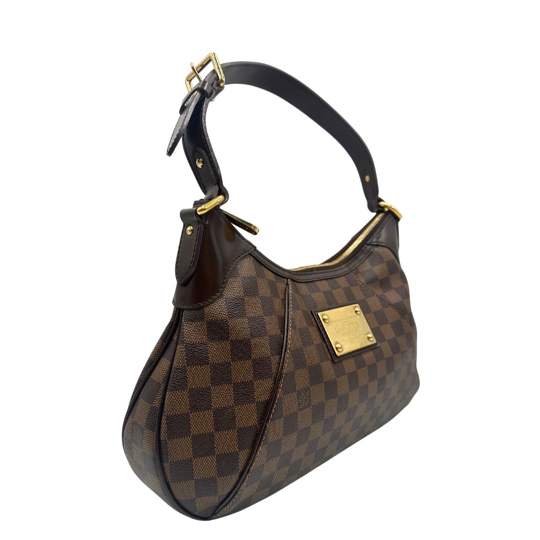 Laterale Borsa Louis Vuitton Thames in canvas Damier Ébène con finiture in pelle testa di moro e parti metalliche dorate. Originale usato, in condizioni ottime. 