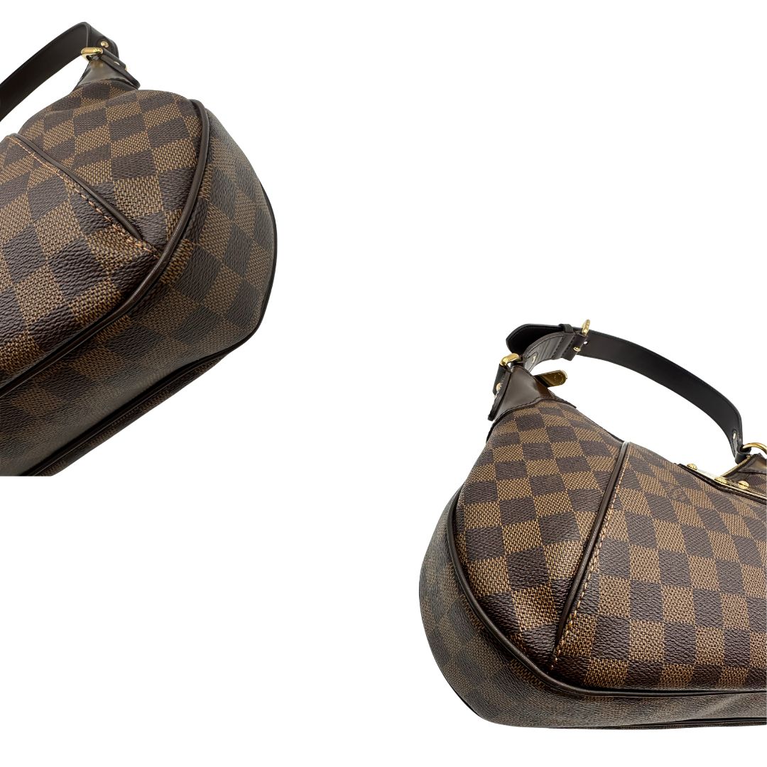Angoli Borsa Louis Vuitton Thames in canvas Damier Ébène con finiture in pelle testa di moro e parti metalliche dorate. Originale usato, in condizioni ottime. 