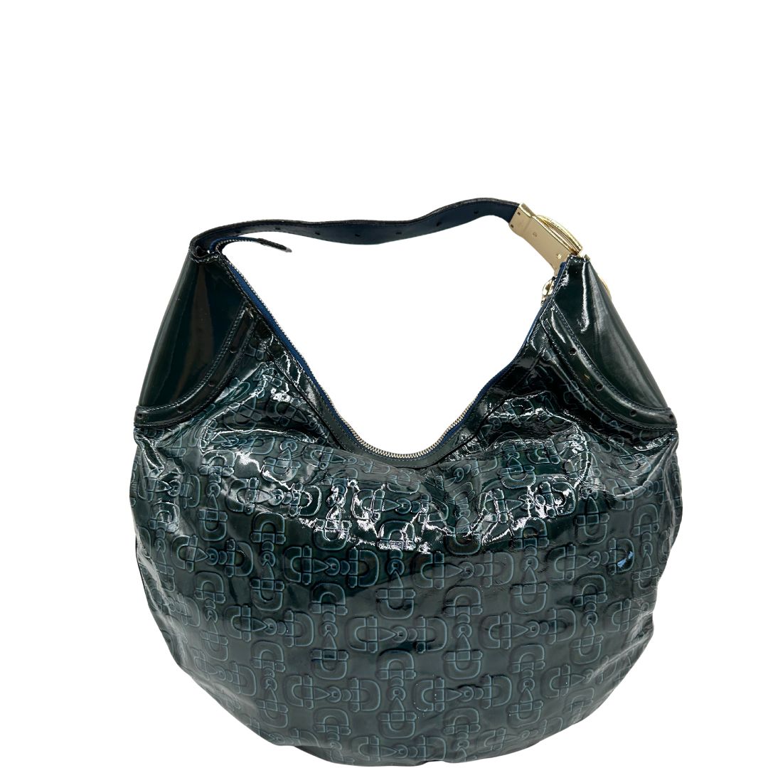 front Borsa Gucci in pelle verniciata verde petrolio con trama Horsebit; munita di un manico singolo e impreziosita da inserti metallici dorati.
