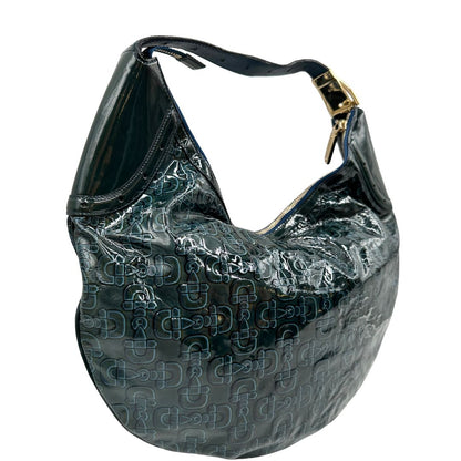 lato Borsa Gucci in pelle verniciata verde petrolio con trama Horsebit; munita di un manico singolo e impreziosita da inserti metallici dorati. 