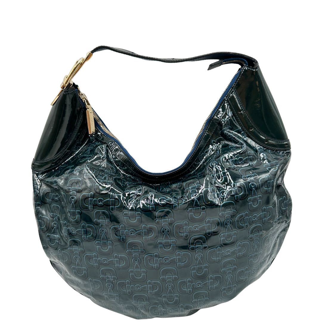 retro Borsa Gucci in pelle verniciata verde petrolio con trama Horsebit; munita di un manico singolo e impreziosita da inserti metallici dorati. 