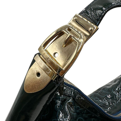 metalleria Borsa Gucci in pelle verniciata verde petrolio con trama Horsebit; munita di un manico singolo e impreziosita da inserti metallici dorati. 