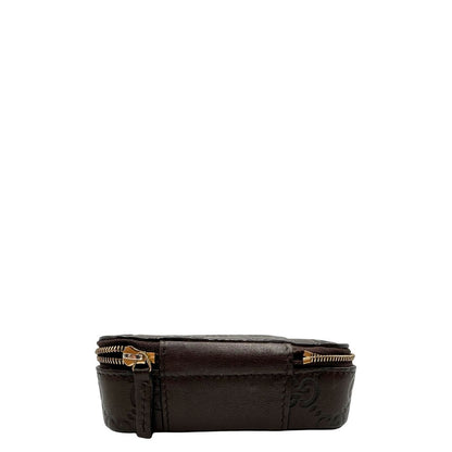 Portagioie Gucci in pelle marrone testa di moro con trama GG e parti metalliche dorate. Completo di dustbag. Originale, usato, in condizioni ottime. 