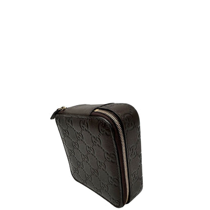 Portagioie Gucci in pelle marrone testa di moro con trama GG e parti metalliche dorate. Completo di dustbag. Originale, usato, in condizioni ottime. 