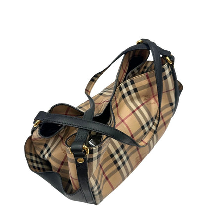 Vista superiore di una borsa Burberry in canvas beige trama Burberry Check, con finiture in pelle nere e parti metalliche dorate. Munita di dustbag.