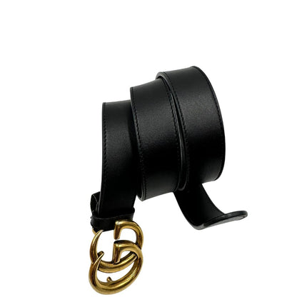 Cintura Gucci Marmont in pelle nera, impreziosita da fibbia GG in metallo dorato. Completa di dustbag.
