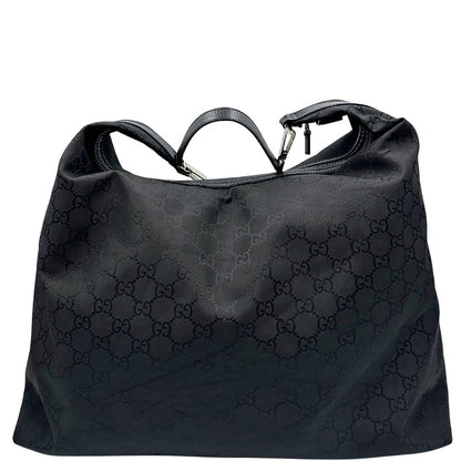 Retro di un borsone Gucci in tessuto trama GG Supreme con parti metalliche argentate e finiture in pelle tono su tono; munita di un manico singolo amovibile. Indossabile a spalla.