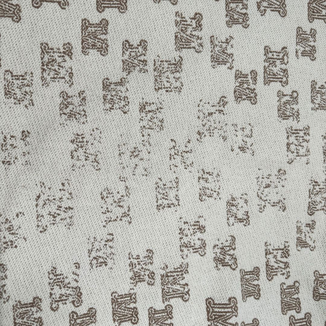 Sciarpa Max Mara in 100% cashmere color cammello con bordi sfrangiati.