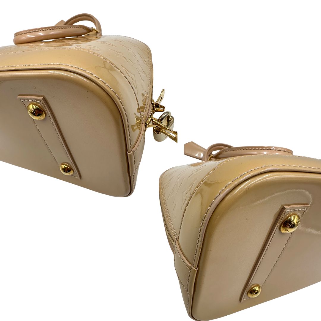 Angoli Alma PM Louis Vuitton in pelle Vernis color noisette con parti metalliche dorate e doppi manici stondati; da portare a mano. Originale, usato, in condizioni ottime. 