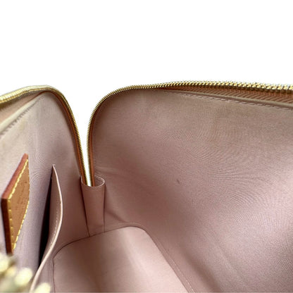 Interno Alma PM Louis Vuitton in pelle Vernis color noisette con parti metalliche dorate e doppi manici stondati; da portare a mano. Originale, usato, in condizioni ottime. 