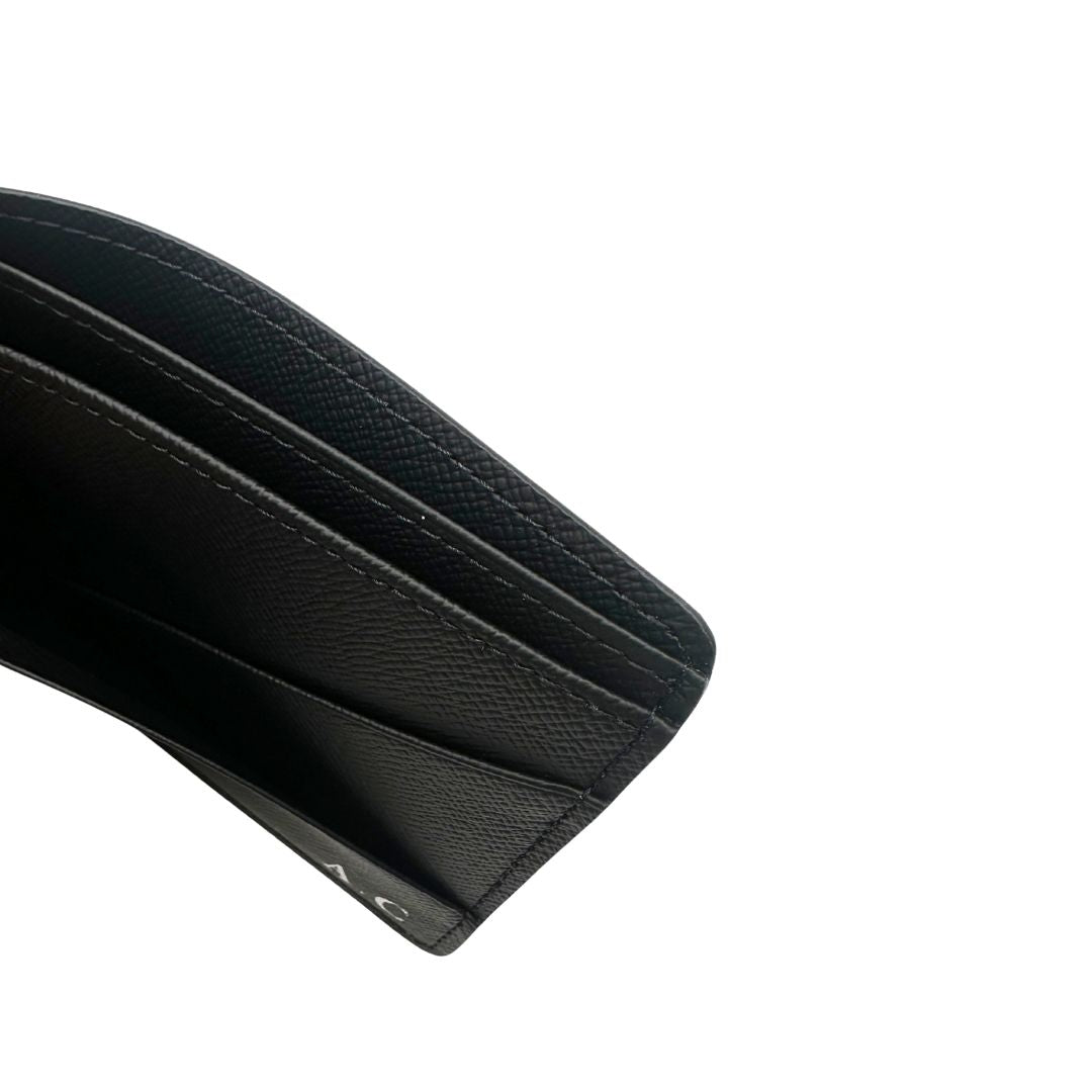 Portafoglio Louis Vuitton Slender in in tela nera Monogram Eclipse, munito di vari scomparti. Completo di corredo. Originale, usato, in condizioni eccellenti. 