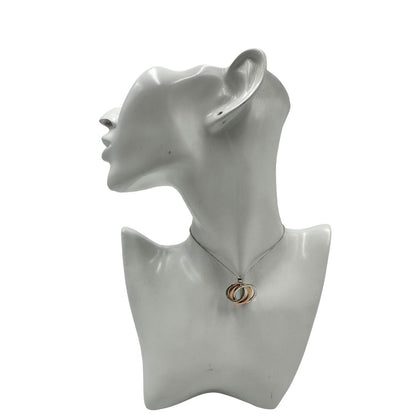 Collana Tiffany&amp;Co. Three Interlocking Rings della collezione Elsa Peretti , in argento 925 con tre ciondoli a cerchio intrecciati, di cui uno color oro. Completo di sacchetto antipolvere. Originale, usato, in condizioni ottime. 