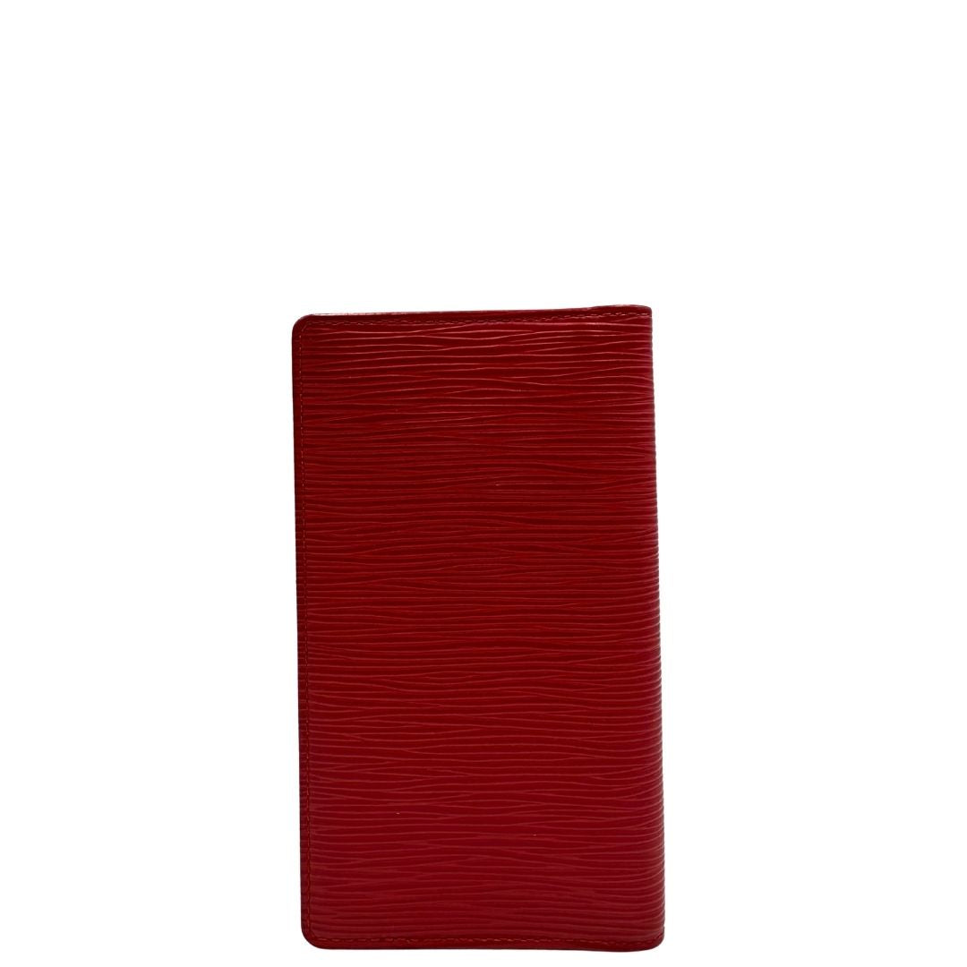 Portacarte Louis Vuitton in pelle Epi rossa; completo di dustbag, di lusso, originale, usato.