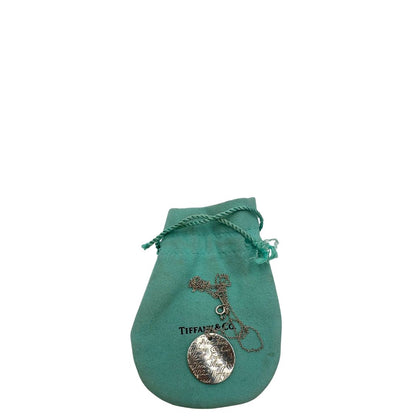 Collana Tiffany&Co. con ciondolo rotondo Notes in argento 925. Completa di sacchetto antipolvere. Originale, usato, in condizioni ottime.