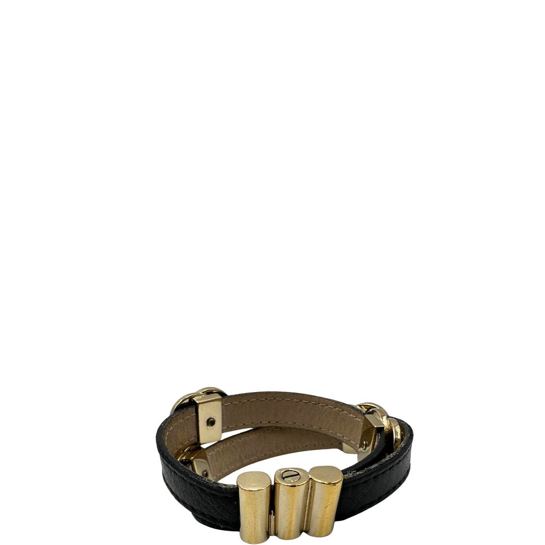 Bracciale Bulgari in pelle nero a doppio giro, con charm in metallo dorati. Completo di scatola logata.