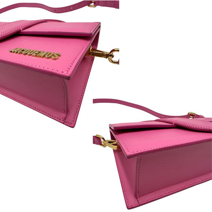 Angoli Le Grand Bambino Jacquemus in pelle neon pink con parti metalliche dorate; da portare a mano o a tracolla. Completa di dustbag. Originale, usato, in condizioni ottime. 