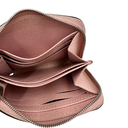 Portafoglio Louis Vuitton Epi rosa con parti metalliche argentate. Completo di scatola logata, di lusso, originale, ottime condizioni.