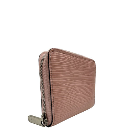 Portafoglio Louis Vuitton Epi rosa con parti metalliche argentate. Completo di scatola logata, di lusso, originale, ottime condizioni.