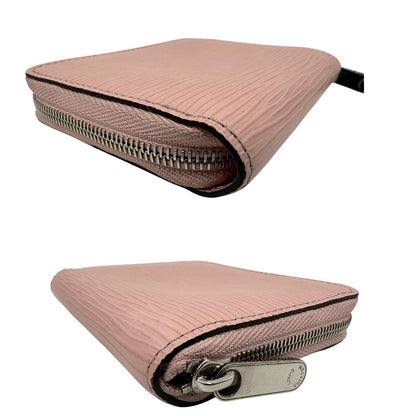 Portafoglio Louis Vuitton Epi rosa con parti metalliche argentate. Completo di scatola logata, di lusso, originale, ottime condizioni.
