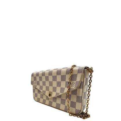 Borsa Louis Vuitton Félicie in canvas Damier Azur con parti metalliche dorate e interno in pelle rosa. Munita di una tracolla in catena amovibile e accessori portacarte, e portamonete estraibili. Originale, usato, in condizioni ottime.