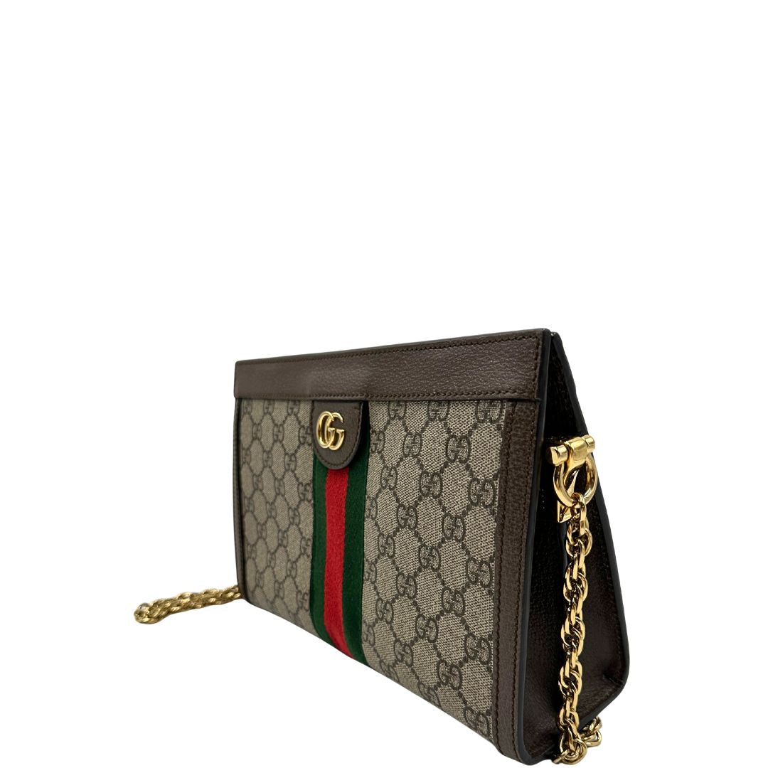 lato Borsa Gucci Ophidia in canvas beige GG con finiture in pelle marrone, striscia Web in tessuto verde e rosso, con parti metalliche dorate. Dotata di una tracolla in catena, di lusso, originale, ottime condizioni. 