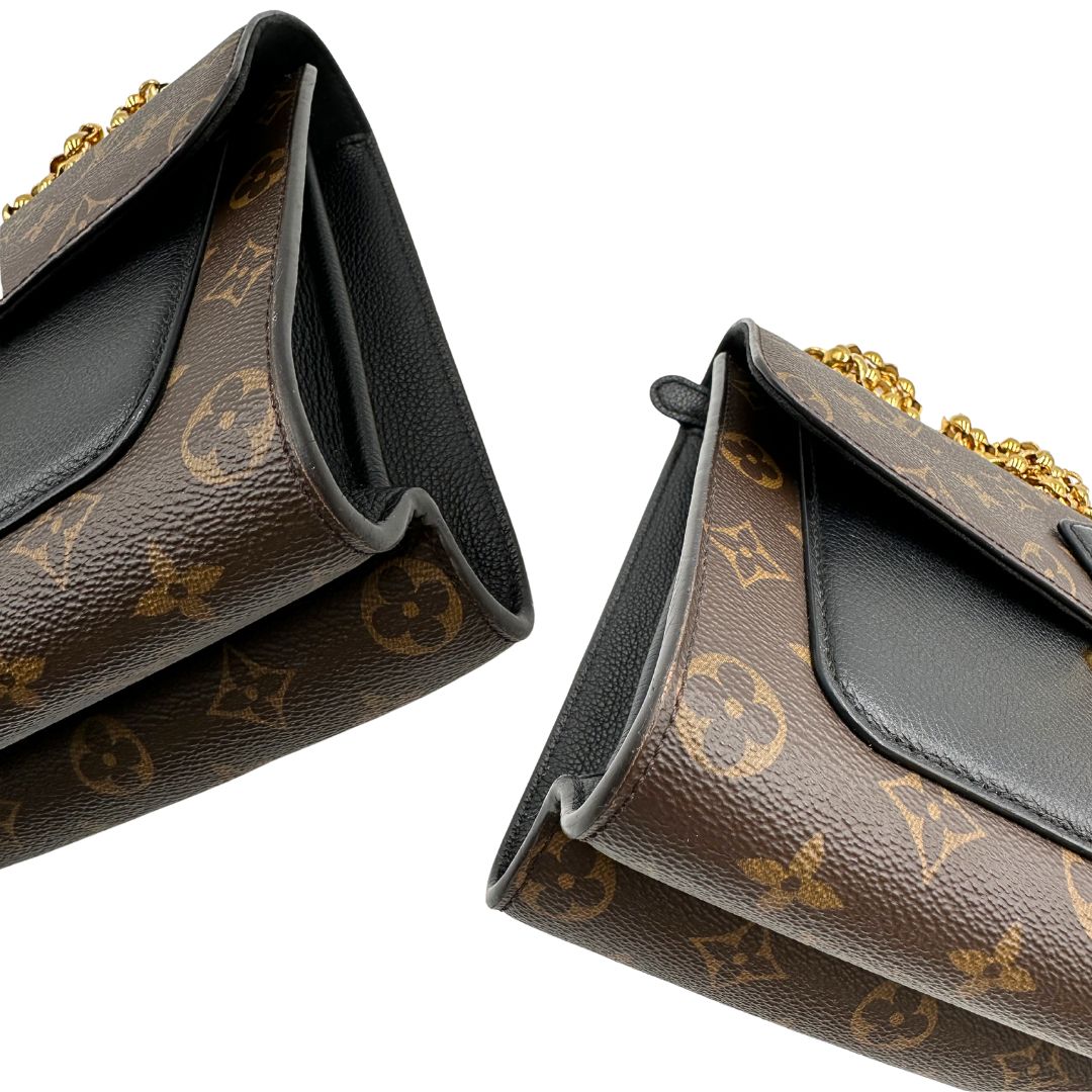 angoli Borsa in canvas marrone monogram, finiture nere e parti metalliche dorate; munita di una tracolla in catena scorrevole. Completa di scatola, di lusso, originale, ottime condizioni. 