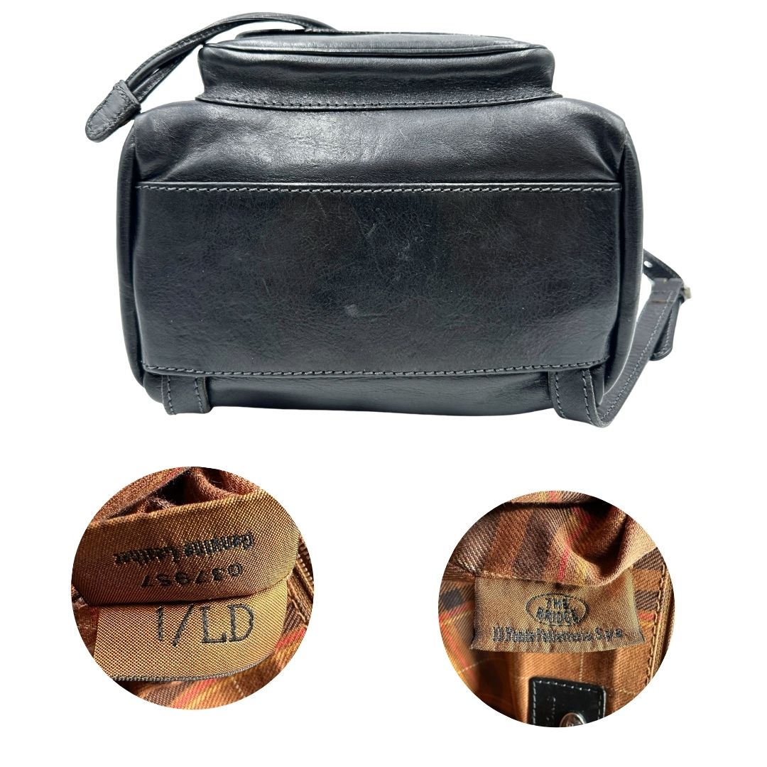 Base e codici di uno zaino The Bridge in cuoio nero con parti metalliche argentate. Cinghie delle bretelle regolabili. Completo di dustbag.